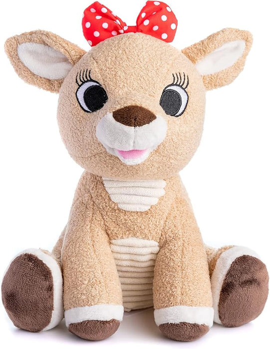 Plush deer toy with a red bow on a white background