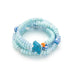 Scout Curated Wears Joy/Bluebird wrap bracelet/necklace with pale blue ceramic beads, patterned beads, and bluebird charm.