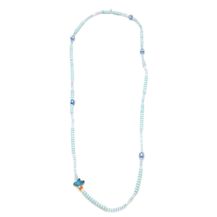Scout Curated Wears Joy/Bluebird wrap bracelet/necklace with pale blue ceramic beads, patterned beads, and bluebird charm.