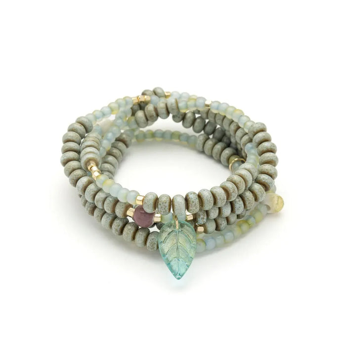 Scout Curated Wears Renewal/Leaf ceramic bead wrap bracelet/necklace with pale green beads and a mint leaf charm.