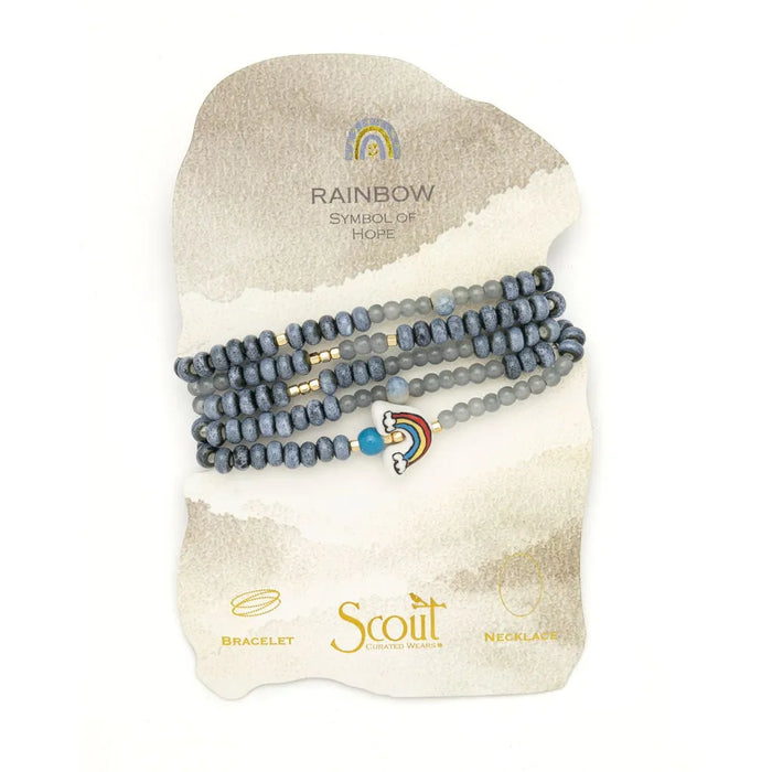Scout Curated Wears Hope/Rainbow ceramic bead wrap bracelet and necklace with gray beads, gold-tone accents, and a colorful rainbow charm.