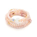 Scout Curated Wears pink beaded Balance/Moon bracelet and necklace on a display card reading “Moon, symbol of balance.