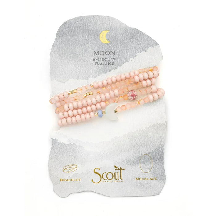 Scout Curated Wears pink beaded Balance/Moon bracelet and necklace on a display card reading “Moon, symbol of balance.