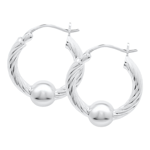 Silver hoop earrings with spherical ends on a white background