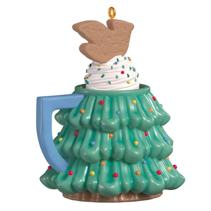 Green tree mug Christmas ornament with blue handle, whipped cream swirl, sprinkles, and cardinal cookie