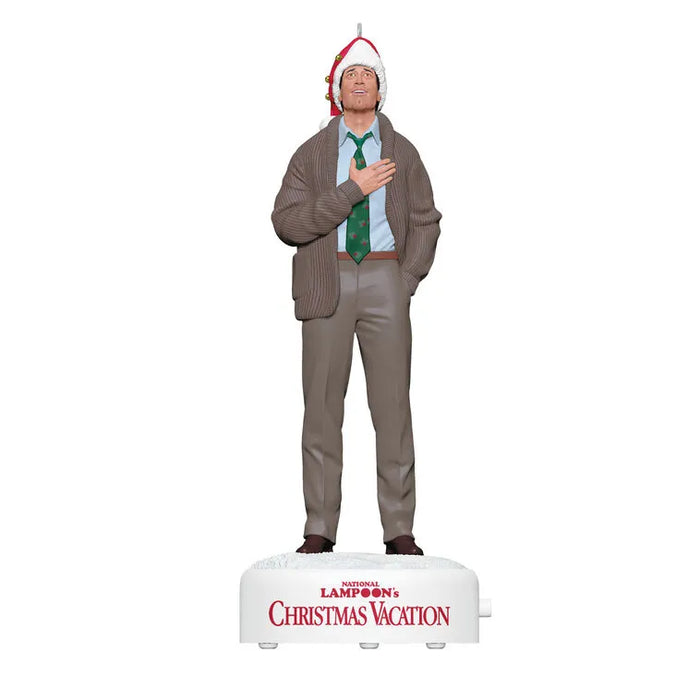 Front view of 2026 Clark Griswold ornament with green patterned tie and awestruck expression on snow base