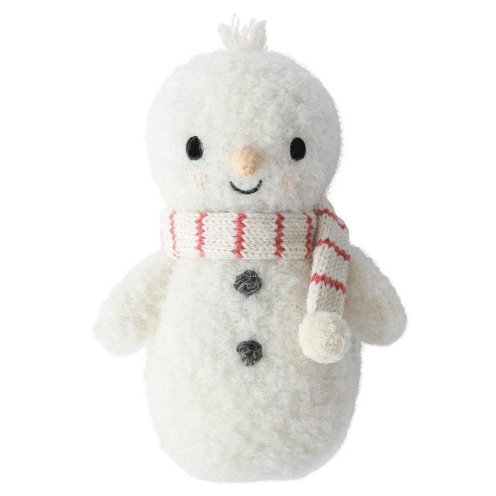 Front view of baby snowman doll with embroidered eyes, peach carrot nose, black buttons, and candy cane scarf.