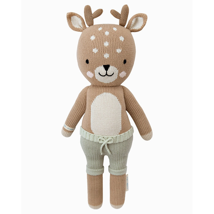 Front view of Cuddle + Kind Elliott the Fawn, hand-knit deer doll with white belly, antlers, and embroidered smile.