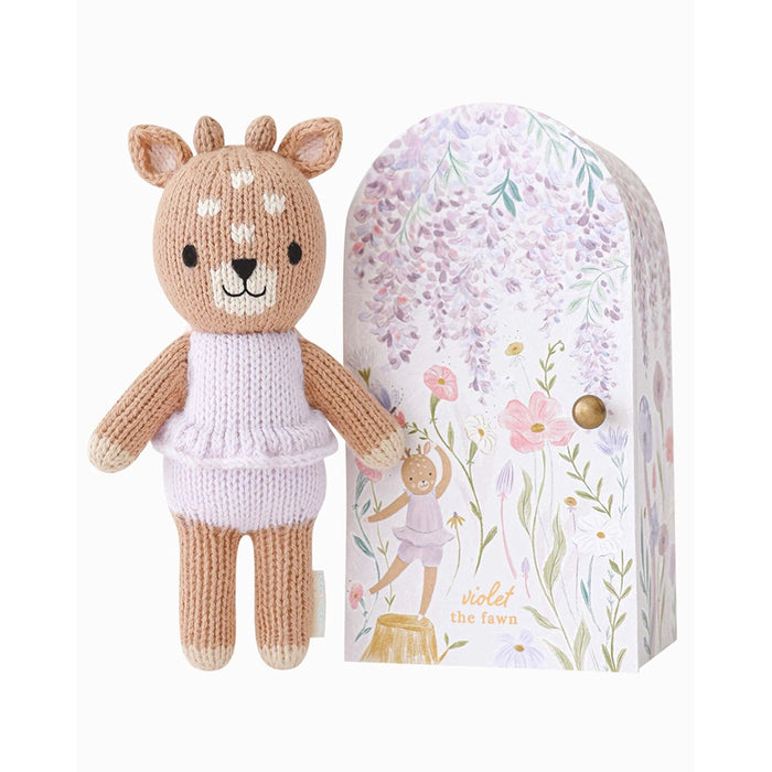 Cuddle + Kind Tiny Violet the Fawn doll displayed with illustrated gift box packaging.