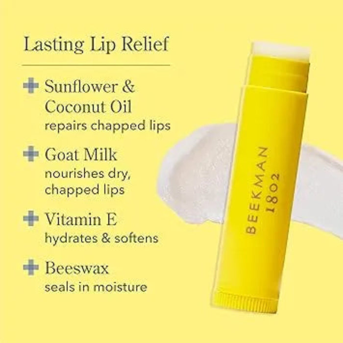 Yellow lip balm stick with ingredients listed on a yellow background