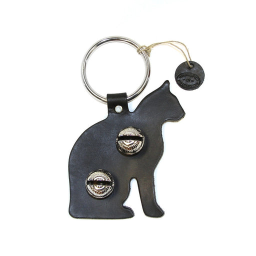Cat-shaped keychain with two circular designs on a white background