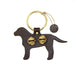 Dog-shaped keychain with gold details on a white background