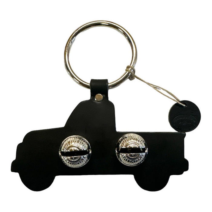 Black keychain with two silver buttons on a white background