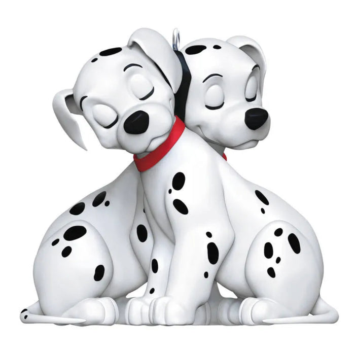 Hallmark 2026 Disney 101 Dalmatians ornament featuring cuddling spotted puppies with red collars
