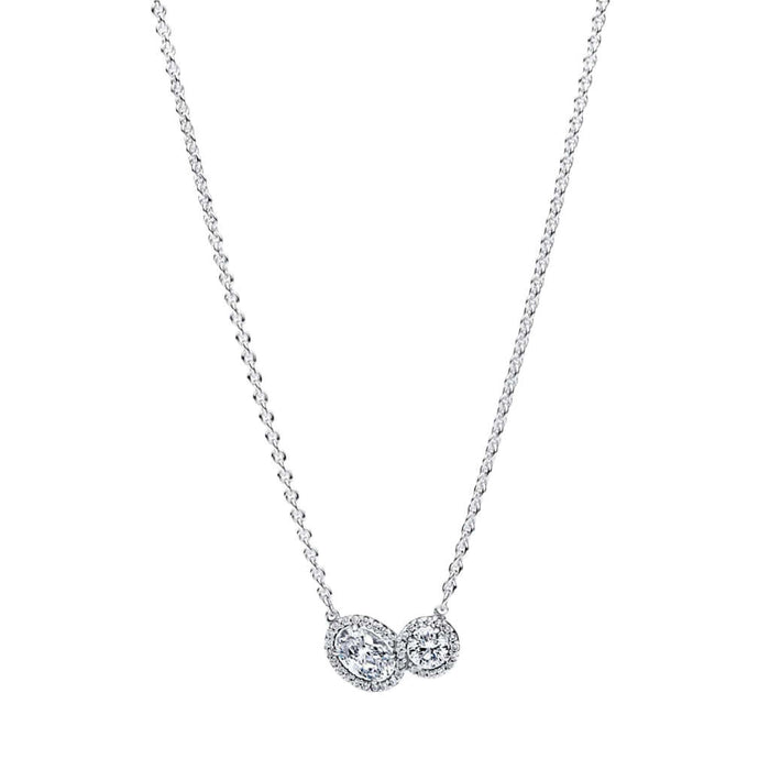Silver necklace with a double heart pendant on a white background
