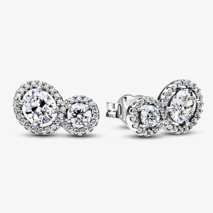 Pair of diamond stud earrings on a white background