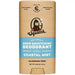 Dr. Squatch deodorant stick with coastal mist scent on a beige background