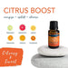 Airoma Citrus Boost essential oil bottle on a stone with citrus fruit icons and text on a white background