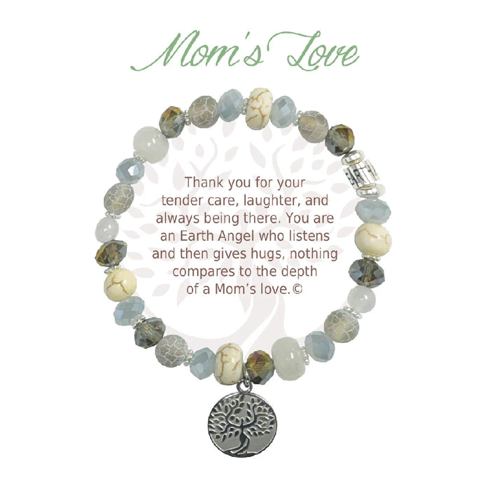 A close-up of a mom's love bracelet featuring a delicate heart charm, symbolizing affection and connection.