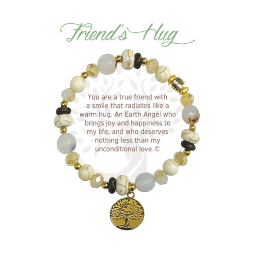 Two friends embrace while wearing matching friendship bracelets, symbolizing their bond and connection.