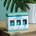 Airomé Breathe Clear essential oil gift set packaging on a wooden surface with a plant in the background.