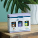 Airome Rest & Relax essential oil gift set on a wooden surface with a plant in the background