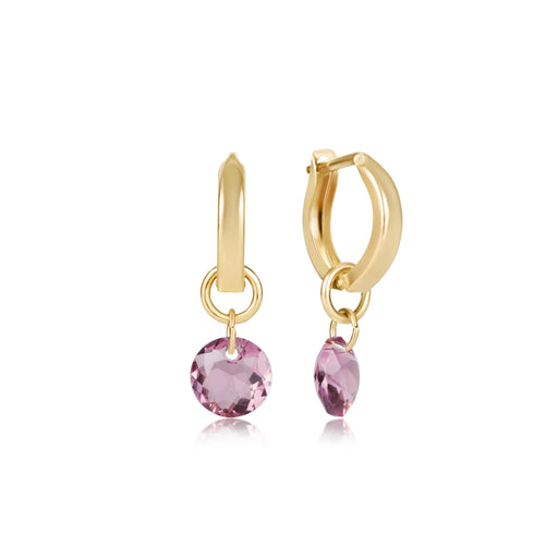 "The sleek hoop design pairs beautifully with the vibrant gemstone-inspired drops, creating a timeless accessory that effortlessly transitions from day to evening wear."