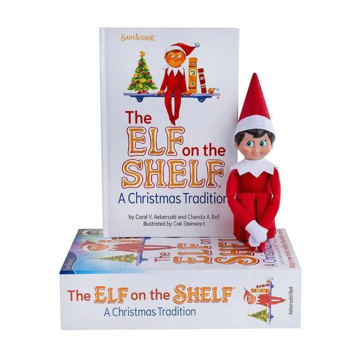 Elf on the Shelf figure with book titled 'The Elf on the Shelf: A Christmas Tradition' on a white background