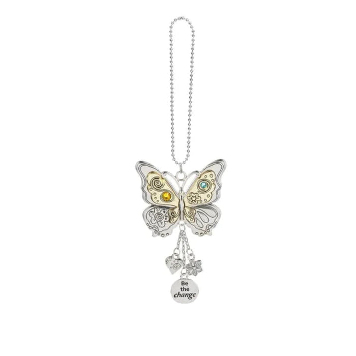 Butterfly-shaped keychain with charms on a white background