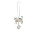Cat-shaped keychain with small charms on a white background