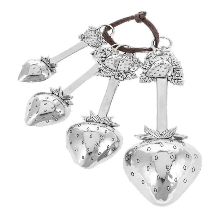 Set of silver strawberry-shaped spoons on a white background