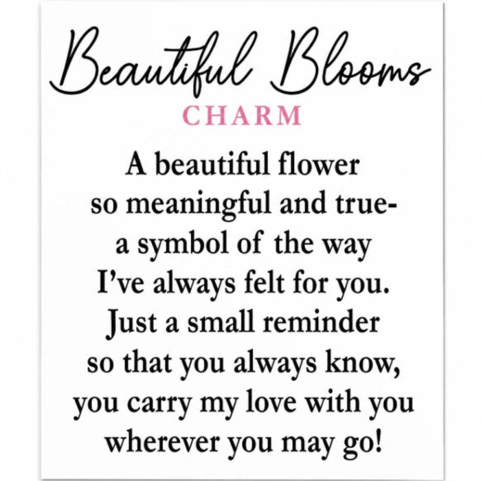  Carry a gentle reminder of beauty, purity, and new beginnings with the Ganz Beautiful White Flowers Bloom Pocket Token. 