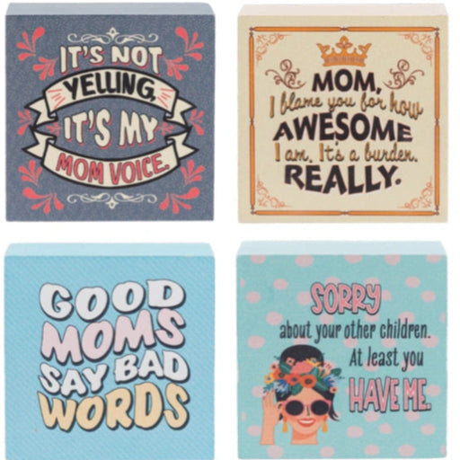 This Ganz Humor Helps Mom Block Talk 24-Piece Set brings a cheerful touch of humor to any mom’s space.