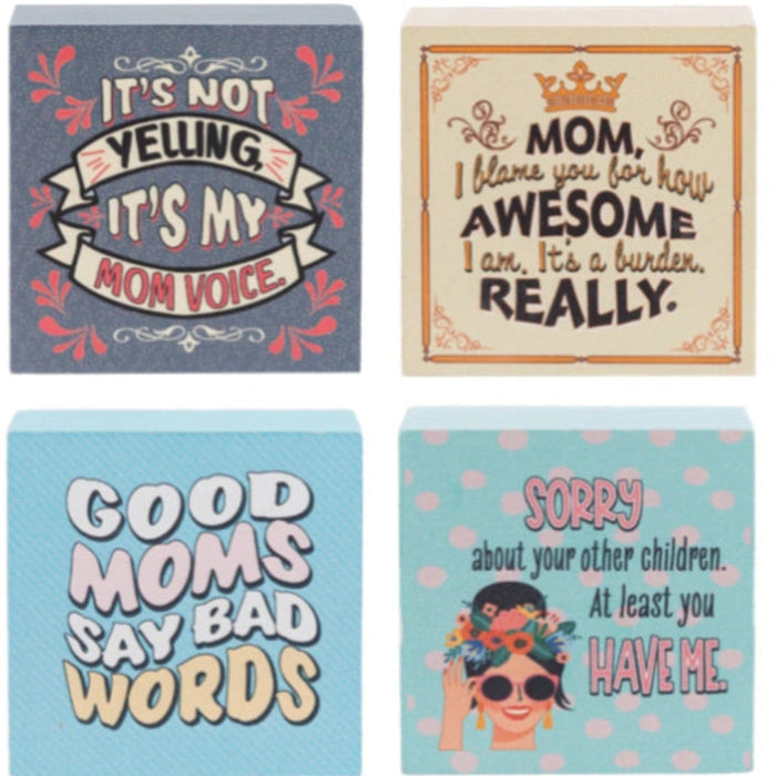 This Ganz Humor Helps Mom Block Talk 24-Piece Set brings a cheerful touch of humor to any mom’s space.