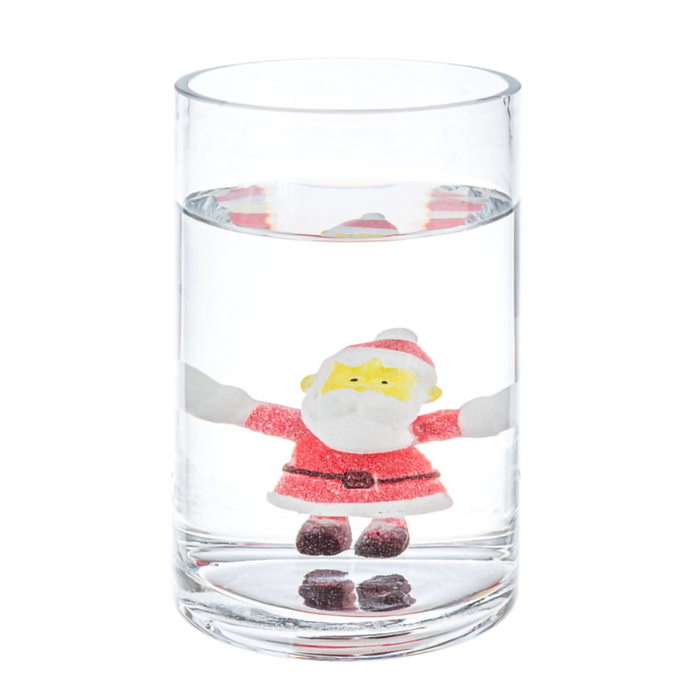 Clear glass with a Santa Claus figure inside on a white background
