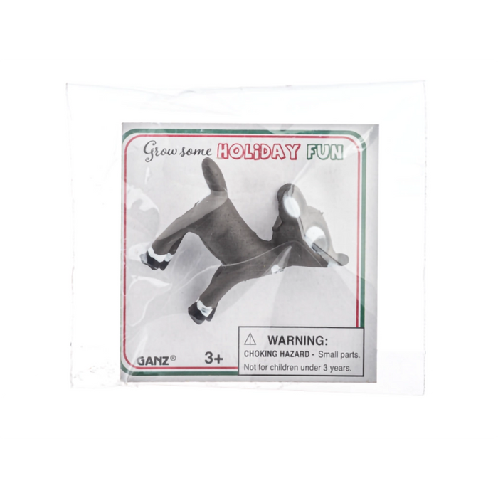 Decorative angel ornament in packaging with 'Ganz' branding on a white background