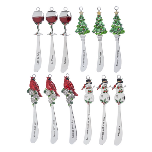 Set of Christmas-themed spoons with decorative ends on a white background
