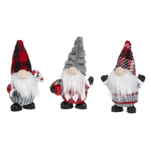 Three festive gnomes with plaid hats on a white background