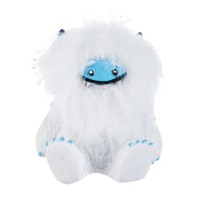 Plush toy resembling a yeti with blue face and feet on a white background