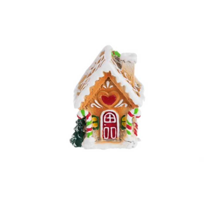 Three miniature gingerbread house ornaments on a white background