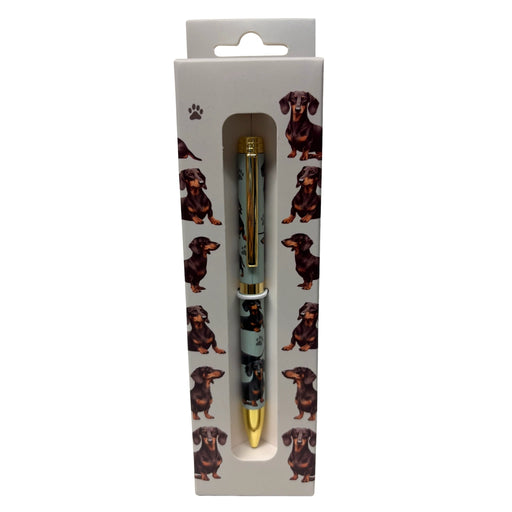 Black Dachshund-themed gift boxed ballpoint pen with gold accents and dog illustrations.