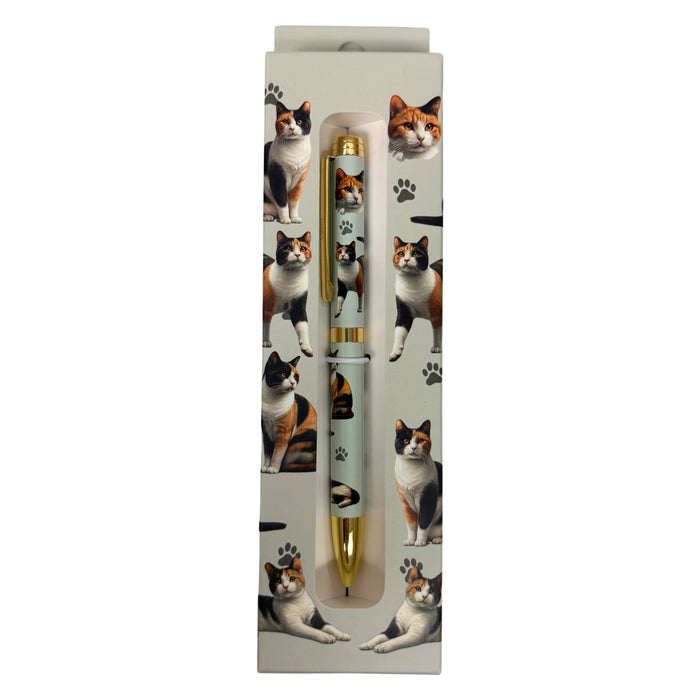 Calico Cat-themed gift boxed ballpoint pen with gold accents and dog illustrations.
