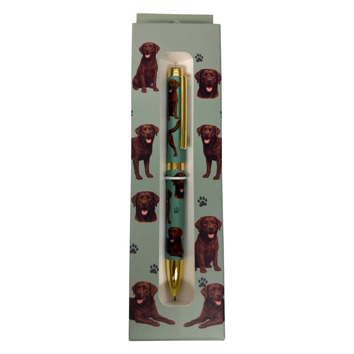 Green Chocolate Labrador-themed gift boxed ballpoint pen with gold accents and dog illustrations.
