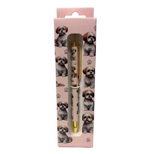 Pink Shih Tzu-themed gift boxed ballpoint pen with gold accents and dog illustrations.