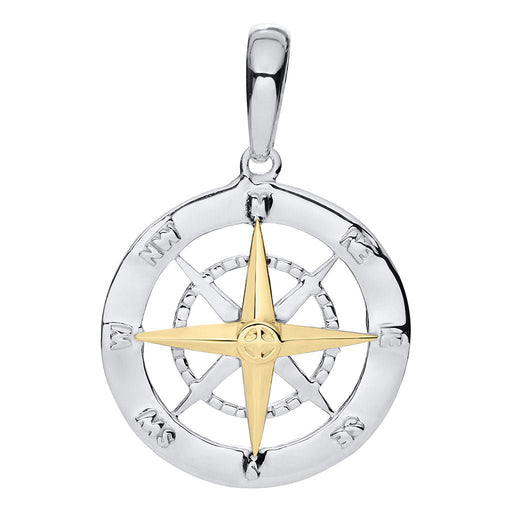 Gold and silver compass pendant on a white background