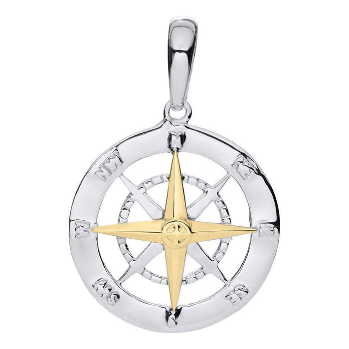 Gold and silver compass pendant on a white background