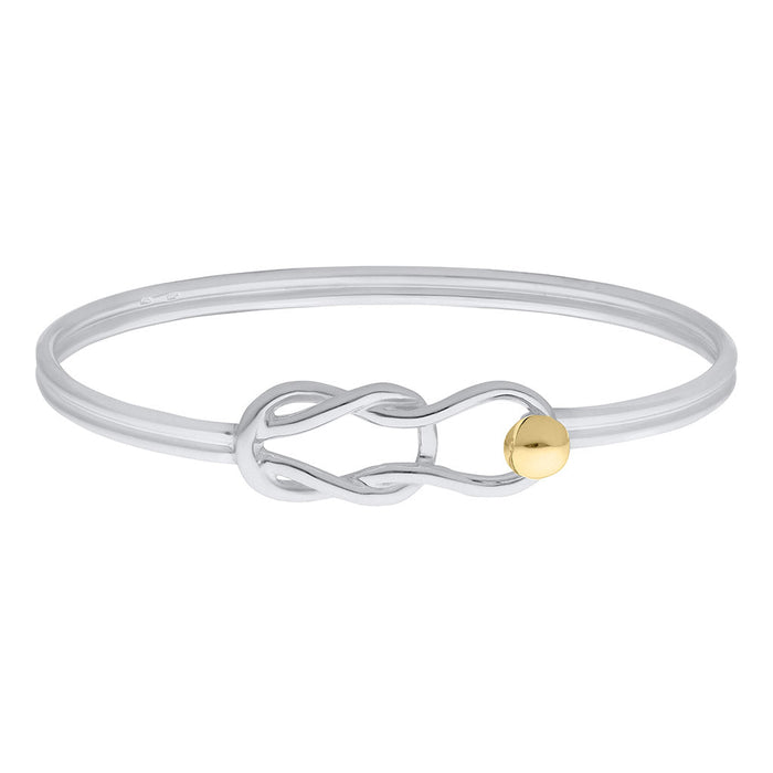 Silver bracelet with a gold accent on a white background