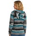 A woman shown from the back wearing a textured knit hooded sweater with horizontal stripes in teal, black, gray, and white, set against a plain white background.