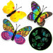 Three colorful butterfly-shaped hair clips are shown on a white background, with one clip open and two closed. A circular inset shows the butterflies glowing green in the dark.