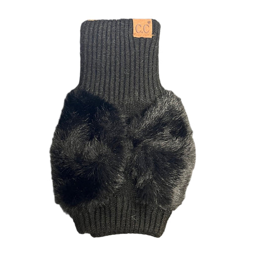 Black knit glove with a fluffy bow on a white Background 